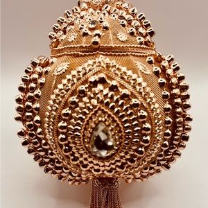 Round decorative handbag with jewel embellishment and embroidery